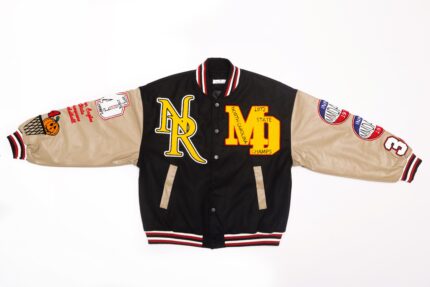 black and beige varsity jacket leather sleeves